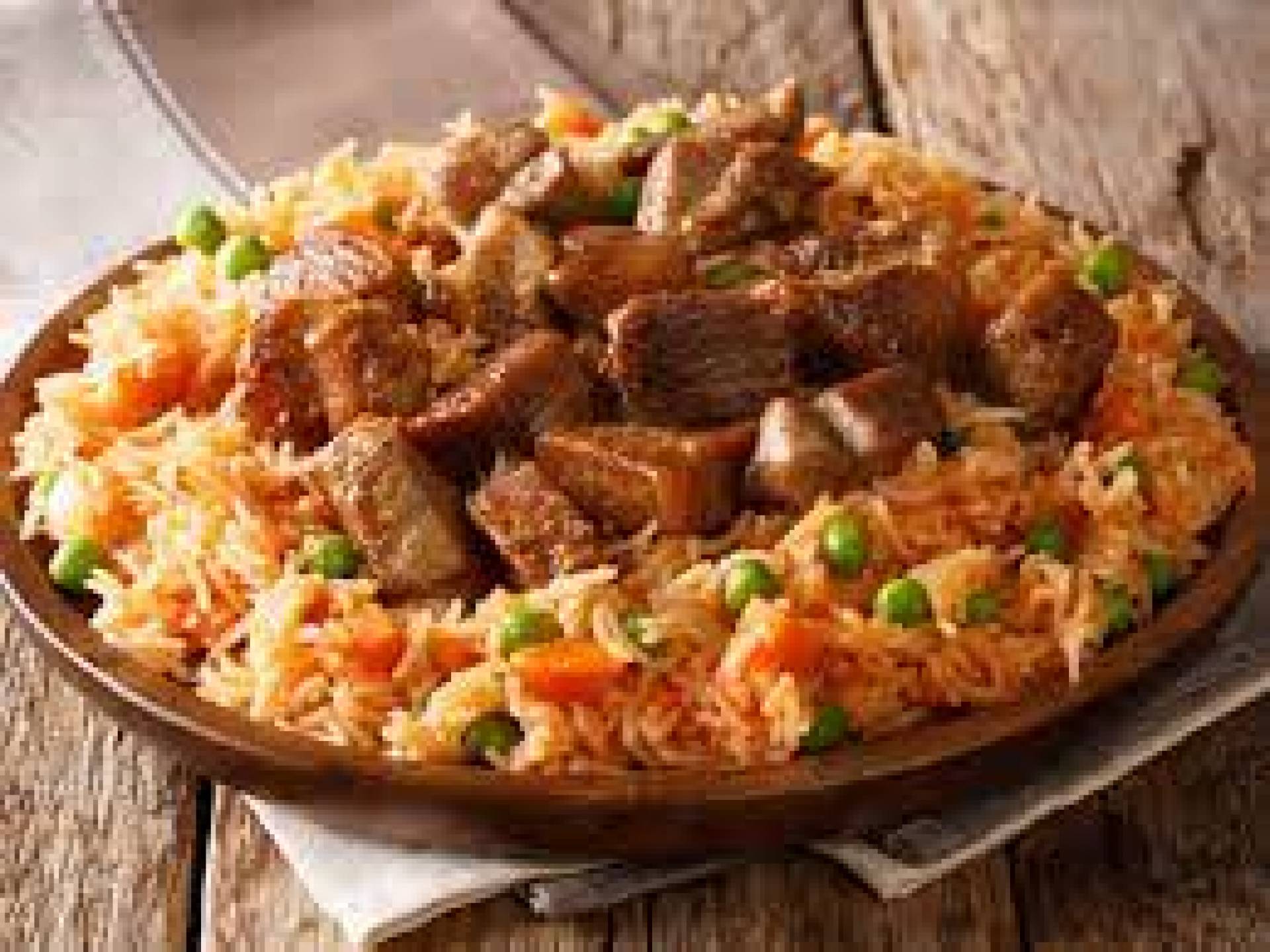 Carne de cerdo al pastor con arroz mexicano