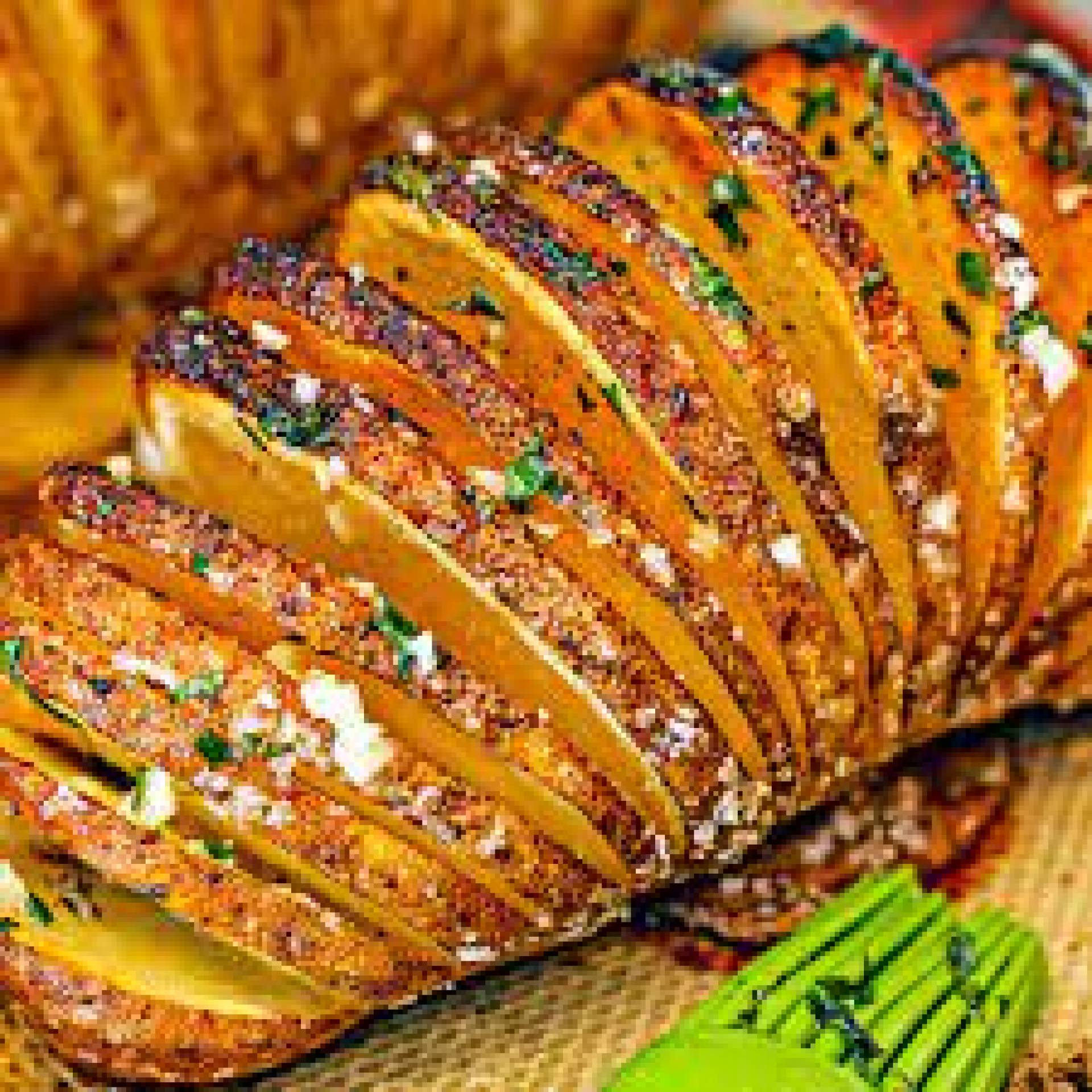 Costillas glaseadas en miel y mostaza con papas hasselback
